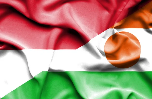 Niger och Indonesien viftande flagga — Stockfoto