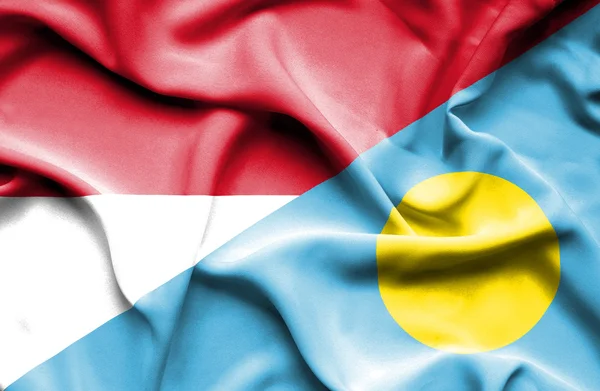 Waving flag of Palau and Indonesia — Stock Photo, Image