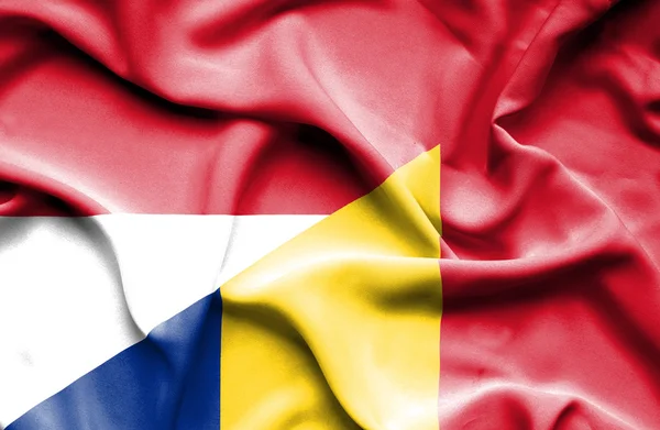 Waving flag of Romania and Indonesia — Stock Photo, Image