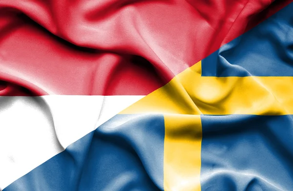 Waving flag of Sweden and Indonesia — Stock Photo, Image