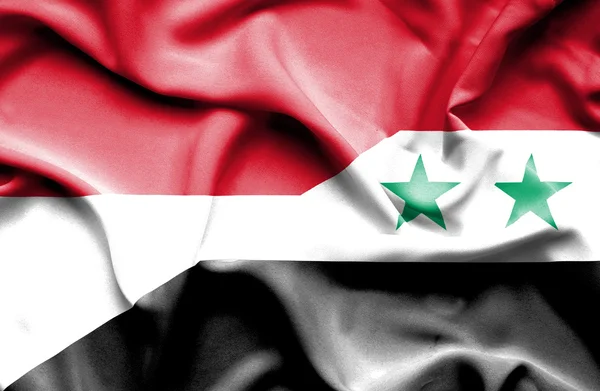 Waving flag of Syria and Indonesia — Stock Photo, Image