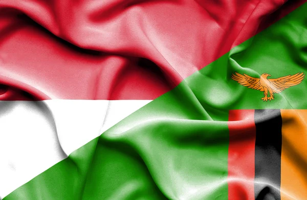 Waving flag of Zimbabwe and Indonesia — Stock Photo, Image