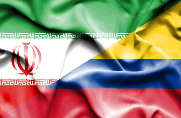 Macha flagą Columbia i Iran — Zdjęcie stockowe