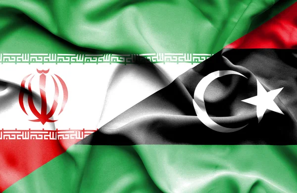 Wapperende vlag van Libië en Iran — Stockfoto