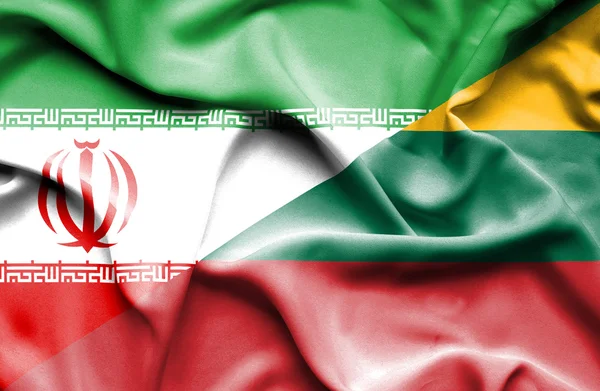 Macha flagą Litwy i Iran — Zdjęcie stockowe