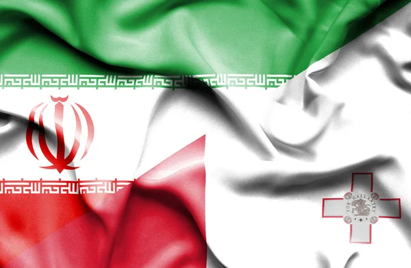 マルタ ・ イランの旗を振っています。 — ストック写真