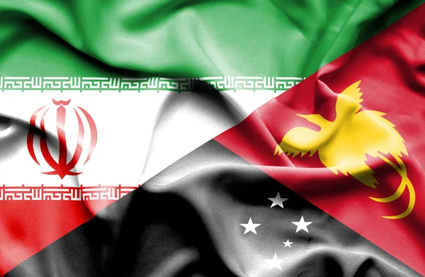 Machać flaga Papui-Nowej Gwinei i Iran — Zdjęcie stockowe