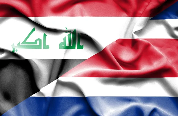 Macha flagą Costa Rica i Iraku — Zdjęcie stockowe