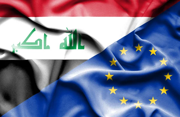 Waving flag of European Union and Iraq — Stock Photo, Image