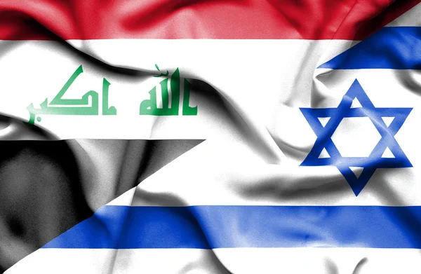 Macha flagą Izraela i Iraku — Zdjęcie stockowe