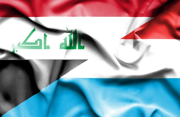 Bandeira ondulada do Luxemburgo e do Iraque — Fotografia de Stock