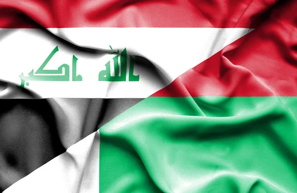 Vlající vlajka Madagaskaru a v Iráku — Stock fotografie