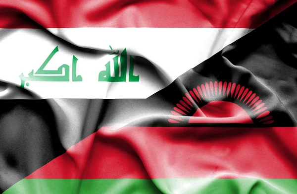 Flagge von Malawi und Irak schwenken — Stockfoto