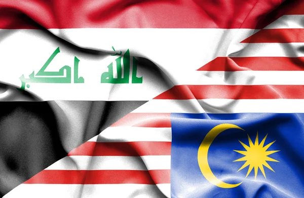 马来西亚和伊拉克那飘扬的旗帜 — 图库照片