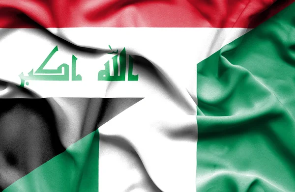 Vlající vlajka Nigérie a v Iráku — Stock fotografie