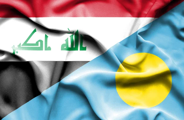 Machać flaga Palau i Iraku — Zdjęcie stockowe