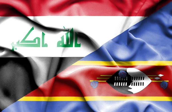 Macha flagą Swazliand i Iraku — Zdjęcie stockowe