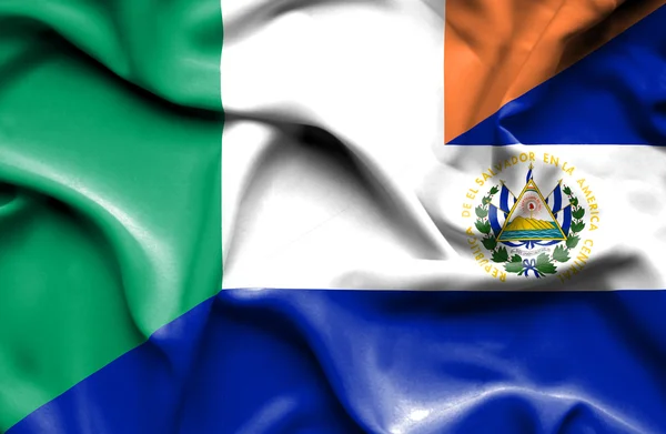 Mávání vlajkou El Salvador a Irska — Stock fotografie