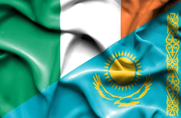 Waving flag of Kazakhstan and Ireland — Stock Photo, Image