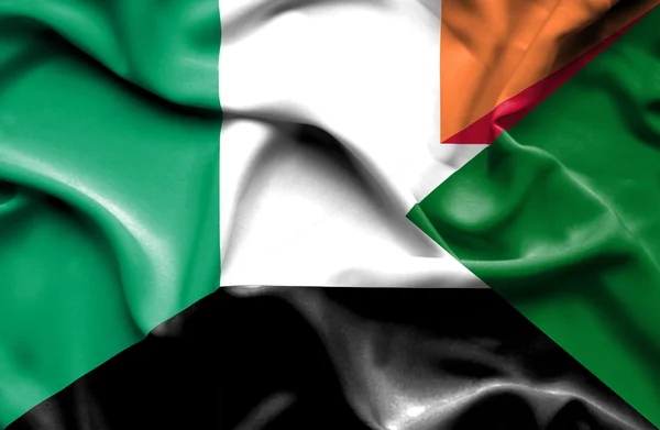 Drapeau agitant du Soudan et de l'Irlande — Photo