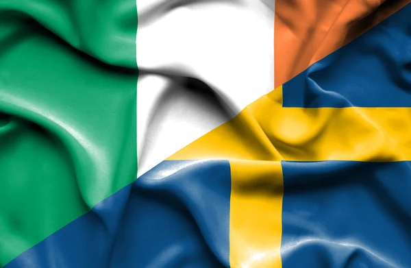 Viftande flagga Sverige och Irland — Stockfoto