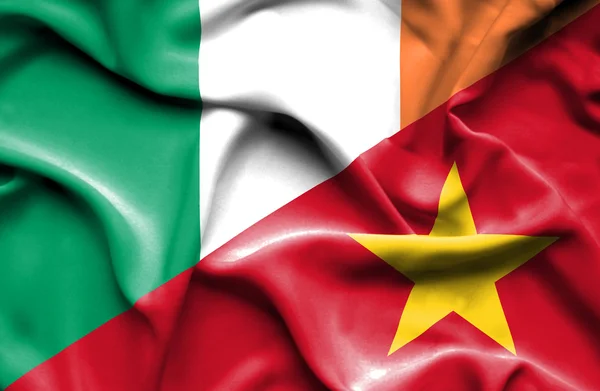 Bandeira ondulada do Vietname e da Irlanda — Fotografia de Stock