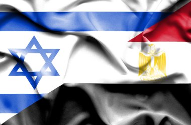 Mısır ve İsrail bayrağı sallayarak