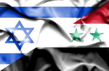 Suriye ve İsrail bayrağı sallayarak