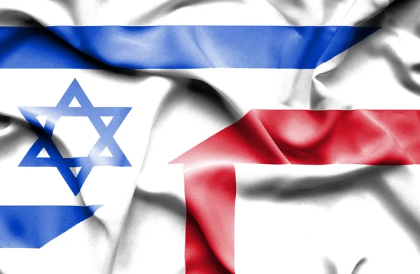 Macha flagą Anglii i Izraela — Zdjęcie stockowe