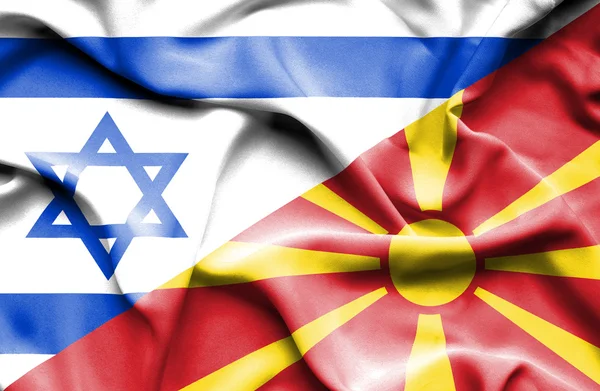 Ondeando la bandera de Macedonia e Israel — Foto de Stock