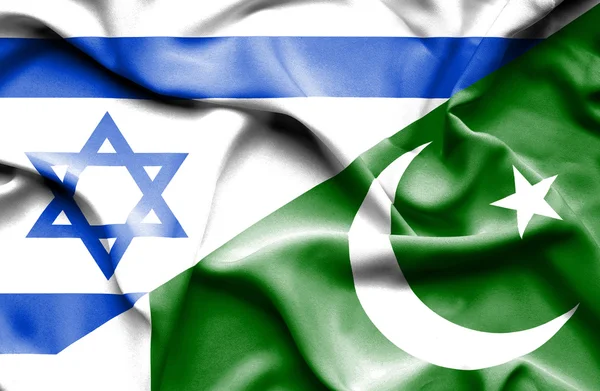 Розмахуючи прапором Пакистану і Ізраїль — стокове фото