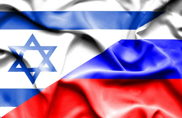 Waving flag of Russia and Israel — Stock Photo, Image