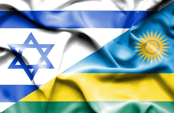 Vlající vlajka Rwandy a Izrael — Stock fotografie