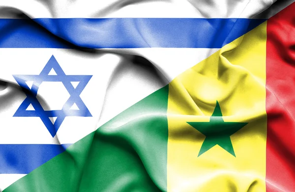 Mávání vlajkou Senegalu a Izrael — Stock fotografie