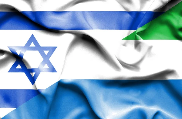 Waving flag of Sierra Leone and Israel — Stock Photo, Image