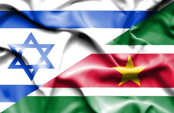 Viftande flagga Surinam och Israel — Stockfoto