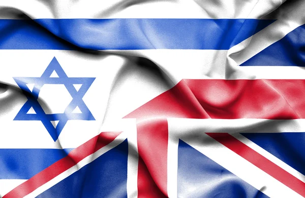 Waving flag of United Kingdom and Israel — Stock Photo, Image