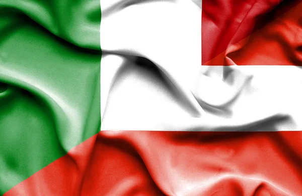 オーストリアとイタリアの旗を振っています。 — ストック写真