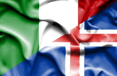 İzlanda ve İtalya bayrağı sallayarak