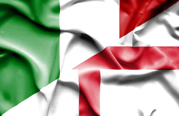 Vinka flagga av England och Italien — Stockfoto