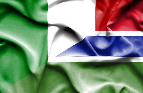 Waving flag of Gambia and Italy — Stock Photo, Image