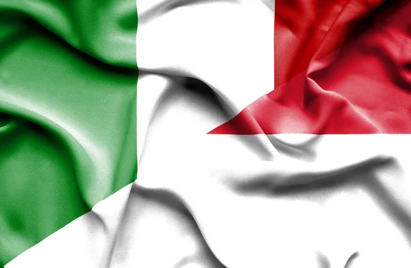 印度尼西亚和意大利那飘扬的旗帜 — 图库照片
