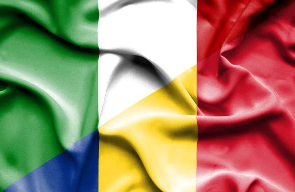 Waving flag of Romania and Italy — Stock Photo, Image