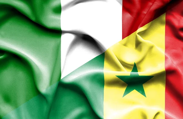 Waving flag of Senegal and Italy — Stock Photo, Image