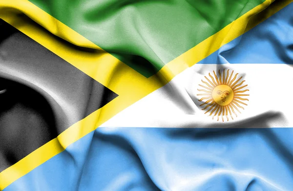 Flagge Argentiniens und Jamaikas schwenken — Stockfoto