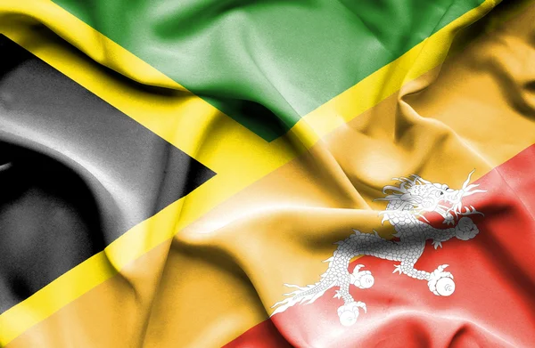 Flagge von Bhutan und Jamaica schwenken — Stockfoto