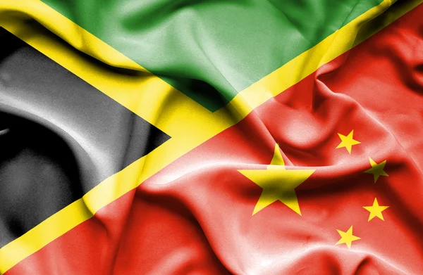 Ondeando la bandera de China y Jamaica — Foto de Stock
