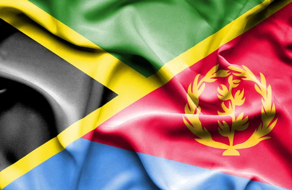 Waving flag of Eritrea and Jamaica — Stock Photo, Image