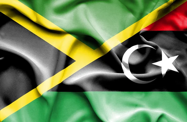 Vlající vlajka Libye a Jamajka — Stock fotografie