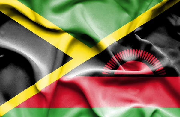 Waving flag of Malawi and Jamaica — Stock Photo, Image